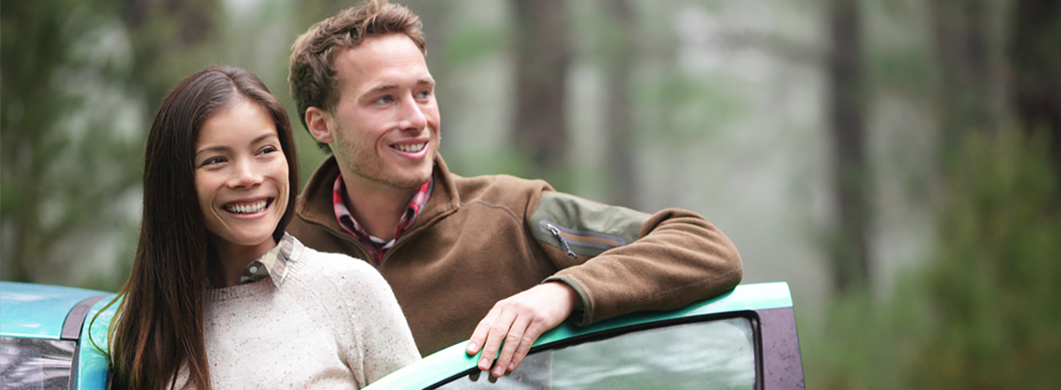 Couple with a car door open